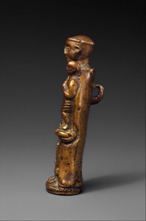 Anthony of Padua [Toni Malua]  Kongo, 16th/19thC  The originally crisp features of the saint - whose feast is today 13 June - have been worn away by close proximity to someone's skin or clothes.  (Met Museum)