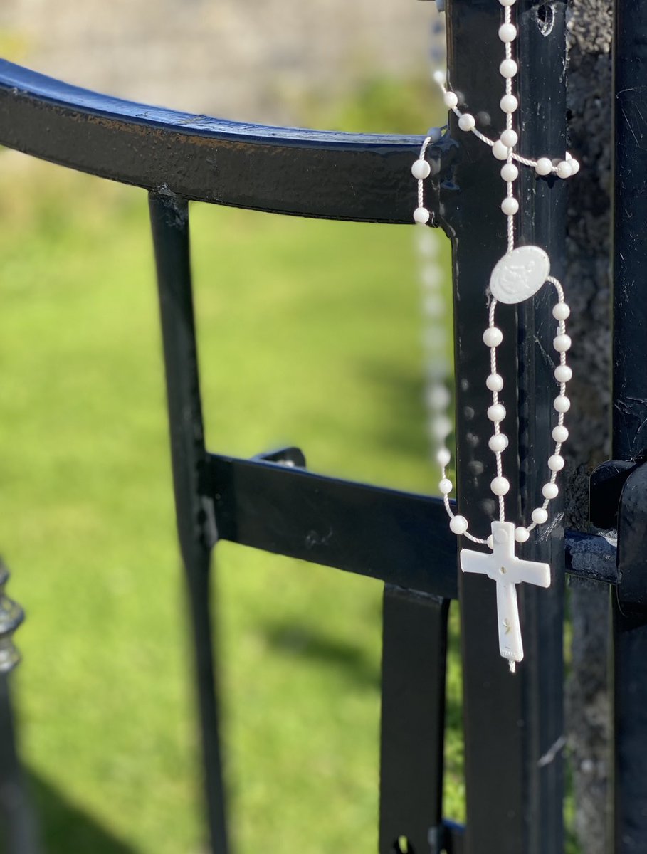 1/4. On the gate leading to the #MemorialGarden of the #Tuam #MotherAndBabyHome a visitor has hung a #RosaryBeads 
It sways gently in the wind.  On Monday we will no longer visit.  Eight foot high wooden hoarding will be erected while it will remain to us a sacred space.