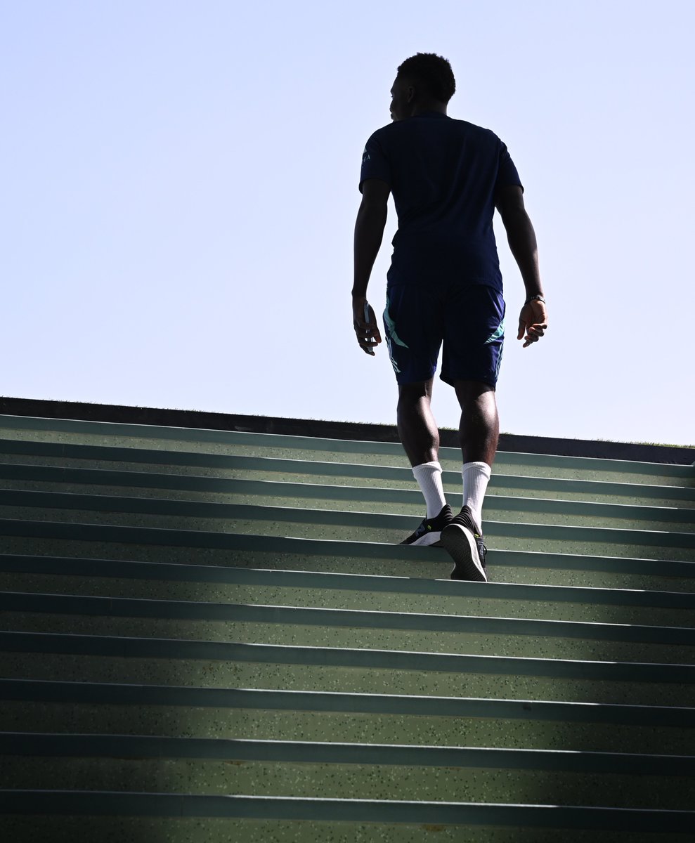 5. Bukayo Saka walks out for training in Dubai, February. Asked Bukayo to walk through the light on the stairs to get this shot. And of course he did.