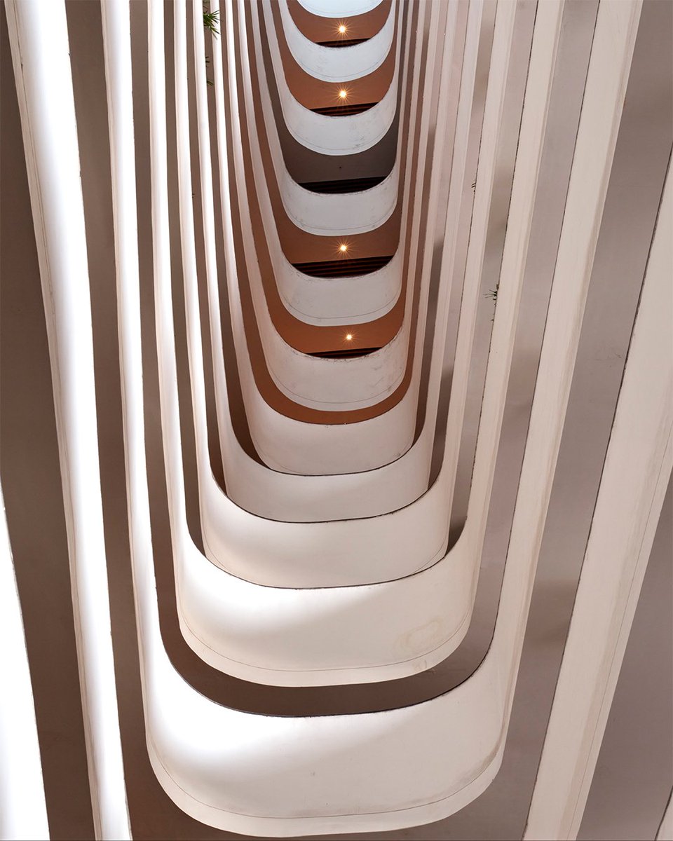 Shaded landscaped courts form the social spine of the Surat Diamond Bourse. Designed around water features and seating areas, these courts facilitate open trading, community lunches, and recreational gatherings. 

#SuratDiamondBourse #Morphogenesis #SustainableArchitecture