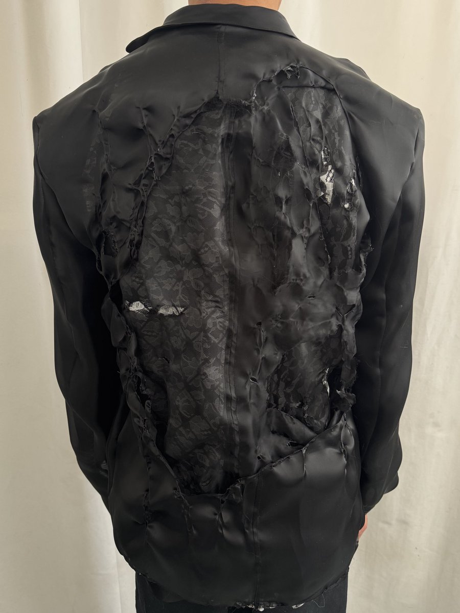 NAZZALSTUDIO's tweet photo. Burnt jacket with keffiyeh underneath https://t.co/vsdNVBNtxt