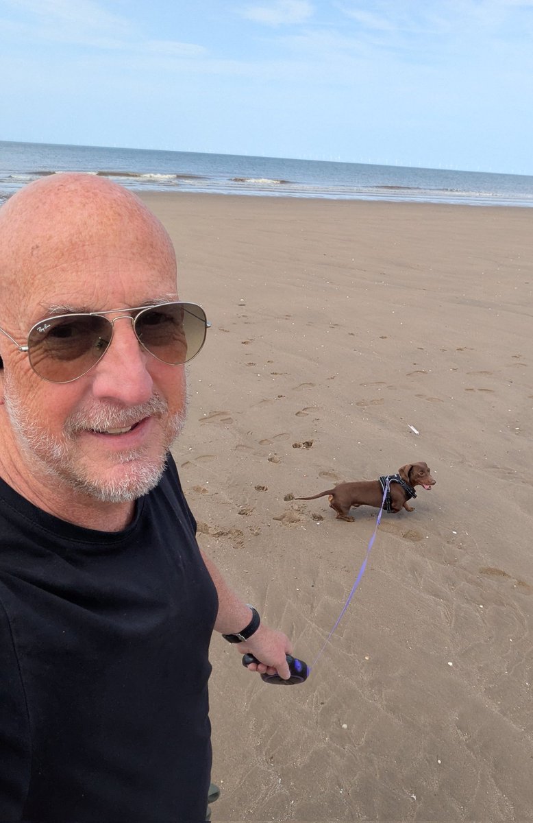 Sammy_UK's tweet photo. Ralph's come for his holidays again.  Walk on the beach listening to the afternoon show with @EleriSion  @BBCRadioWales https://t.co/qtFwVKATcv