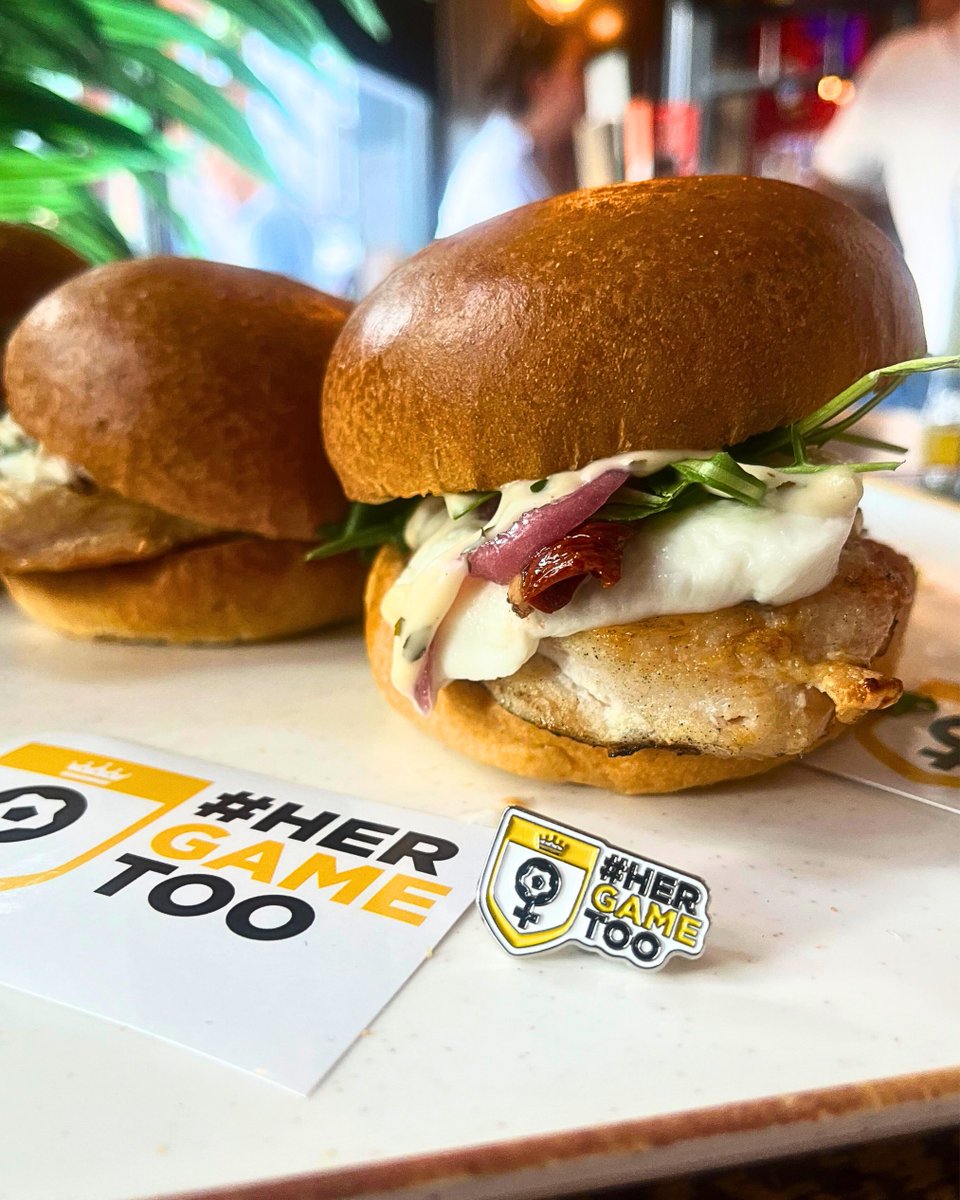 HerGameToo's tweet photo. BIG NEWS! 🌟🍔

We’re SO excited to team up with the incredible Hellman's and women's football legend @alessiarusso7  for the launch of the Hellman's Russo Burger! 😍

📅 Available NOW until 2nd August in 124 Social Pub & Kitchen venues across the UK! 

👀The best bit? £2.50 from every burger sold will be donated straight back to Her Game Too, so we can financially support our partner grassroots girls’ teams! 💛

Grab your delicious Hellman's Russo burger today and help to support the future of women’s football. 🙌🤩

Read more here: https://t.co/G3STGWXDgg...

✍️ @FayeHackwell