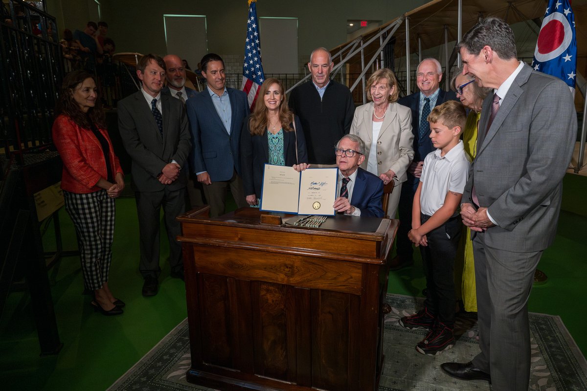 OhioSenateGOP's tweet photo. Today, Gov. DeWine joined Sen. Terry Johnson (sponsor) and Sen. Steve Huffman (co-sponsor) in Dayton for the ceremonial signing of SB 24, naming the 1905 Wright Flyer III, flown at Huffman Prairie, as Ohio’s official state airplane.

#WrightFlyer #OhioHistory #SB24