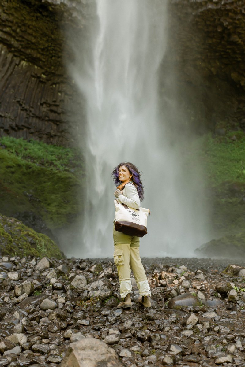Shot at the base of Latourell Falls in Oregon, this moment captures what our brand is all about: timeless craftsmanship, bold adventure, and products made to last a lifetime. The Will Original Utility Tote featured here is built for wherever the journey takes you! #pnw