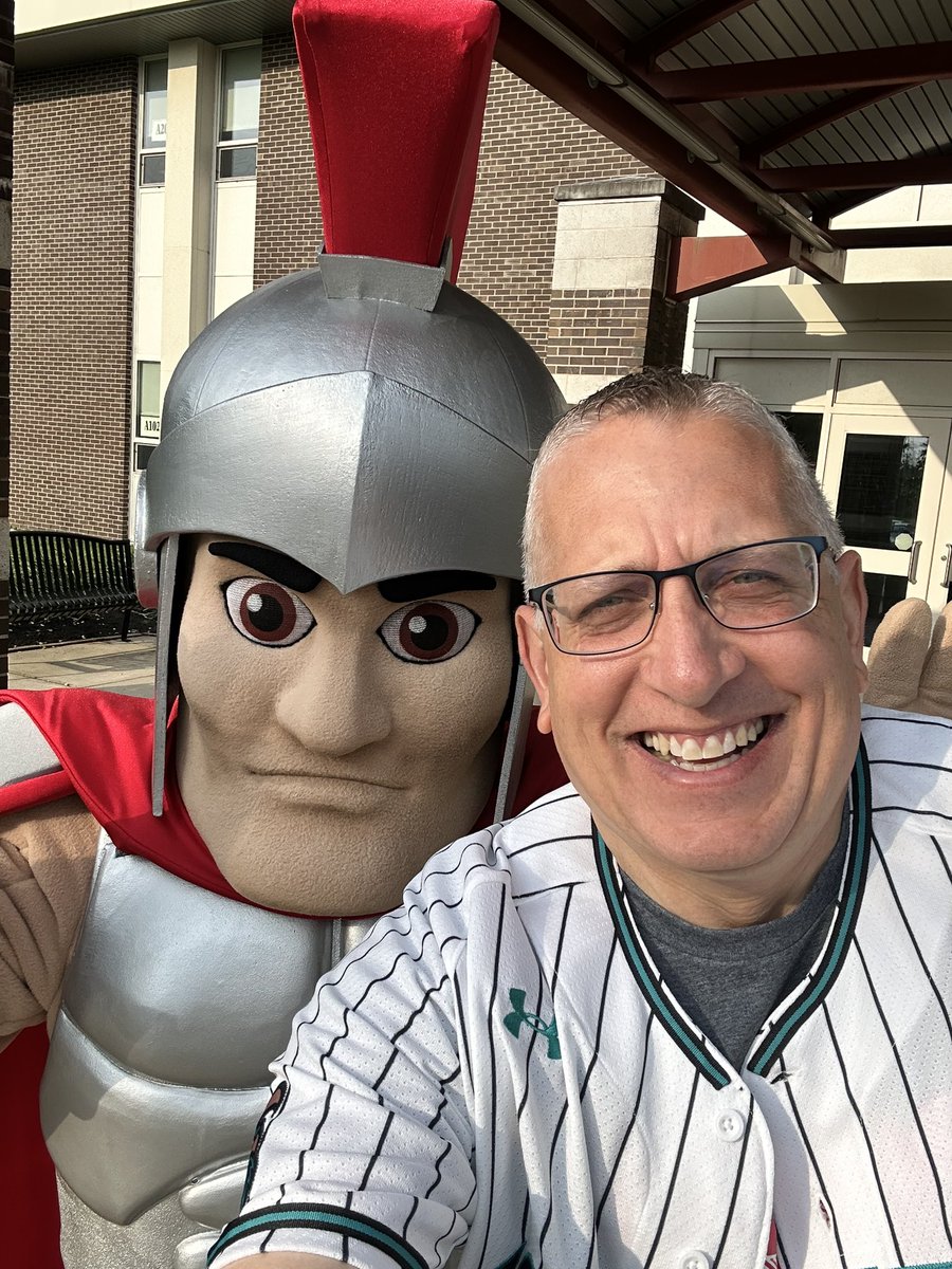 Hanging with Sparty at morning arrival on the last day of school.