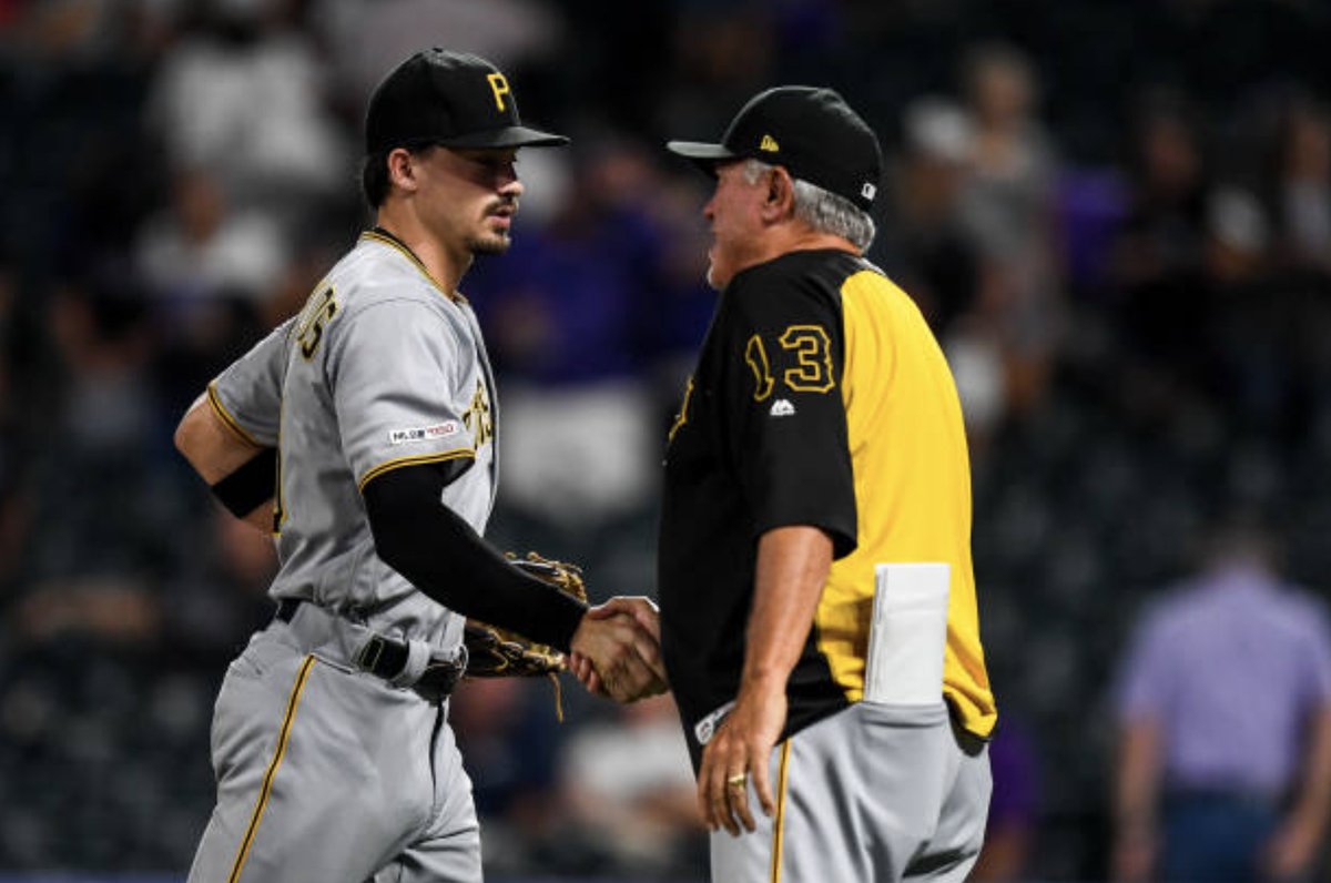 Bryan Reynolds and Clint Hurdle after a win against the Colorado Rockies at Coors Field on August 31, 2019