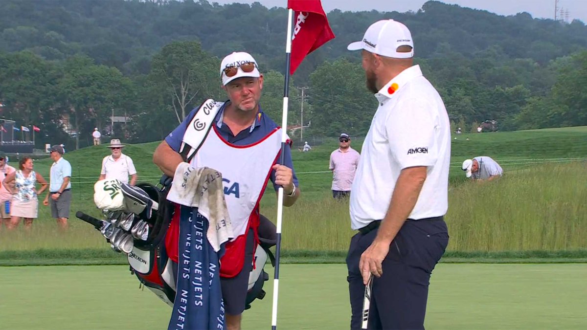 My favorite part is the reaction of his caddie, Darren Reynolds