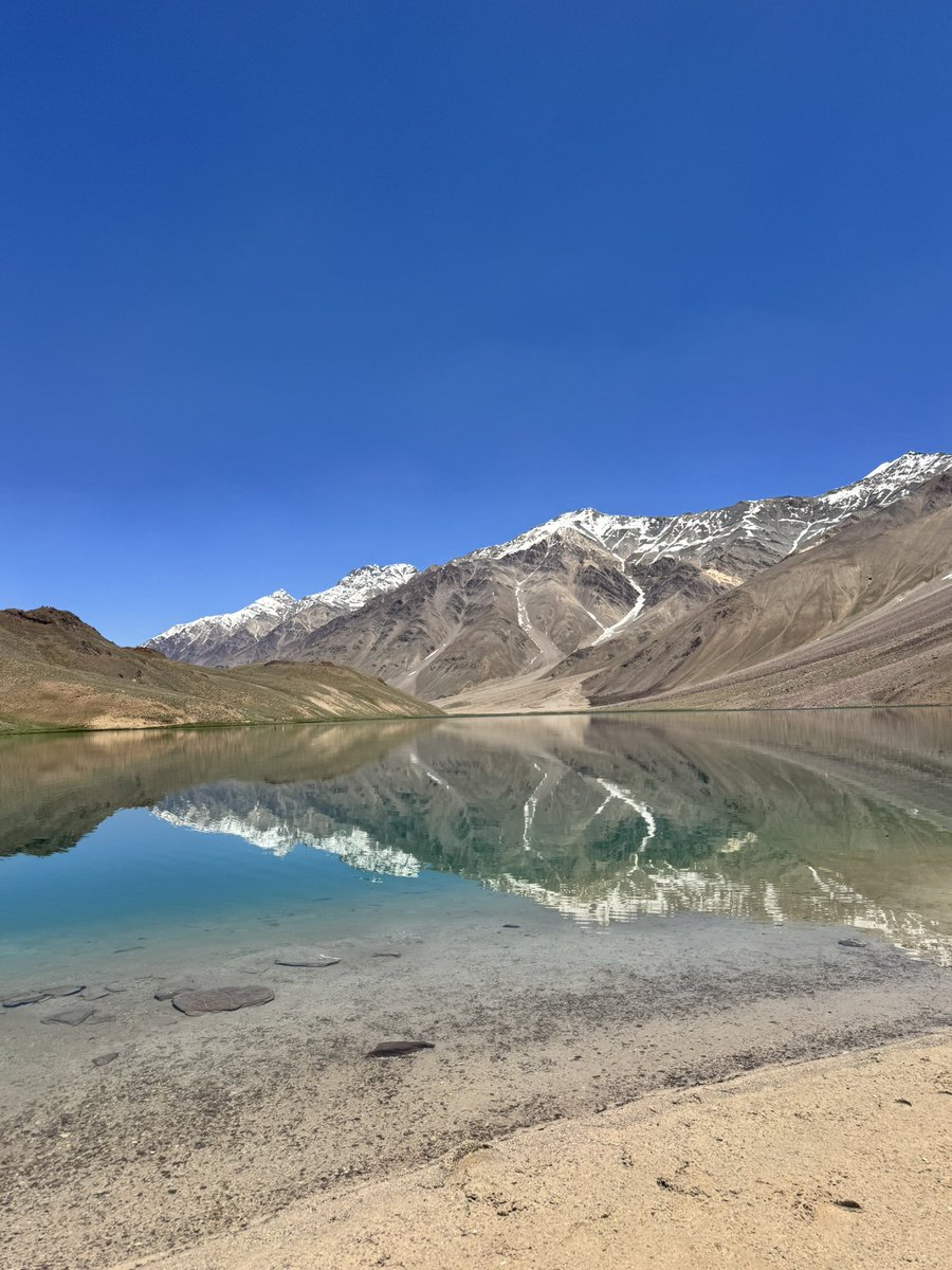 Chandra Tal - a stunning crescent-shaped lake in the Spiti Valley of Himachal Pradesh, is situated at an altitude of approximately 4,300 meters (14,100 feet) in the Himalayas.