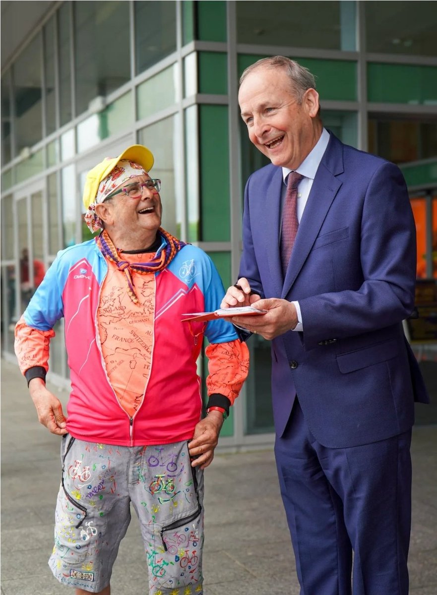 davekeeshan's tweet photo. "Toaiseach Micheal Martin signs BBC presenter Tommy Mallet's travel journal"

... Is not something I thought I would ever experience, what an age to live in. https://t.co/4hJuvbW7hA