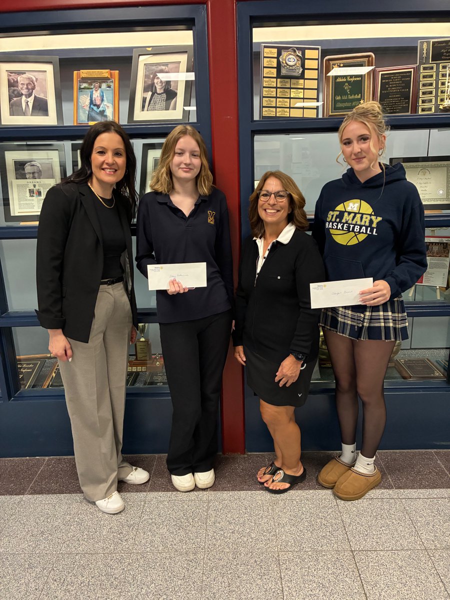 St. Mary's Catholic Secondary School Principal Sofia Palermo, graduation award recipient Abby Katherine, DVSRC member Denise Martins and Ken Turner bursary recipient Abigail Girard share the spotlight. Congratulations to Abby and Abigail as award winners from the Rotary club.
