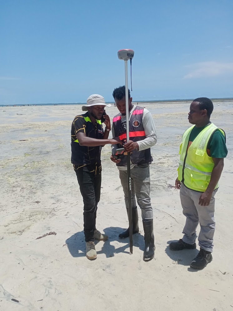 My first survey in coast was a stockpiling survey using aerial and terrestrial measurements. Here, you never mess with elevations you could end up with negative height values. Frame 4: That's me at Kenyatta Beach checking against the MSL, after localizing at nguu tatu SOK Pillar.