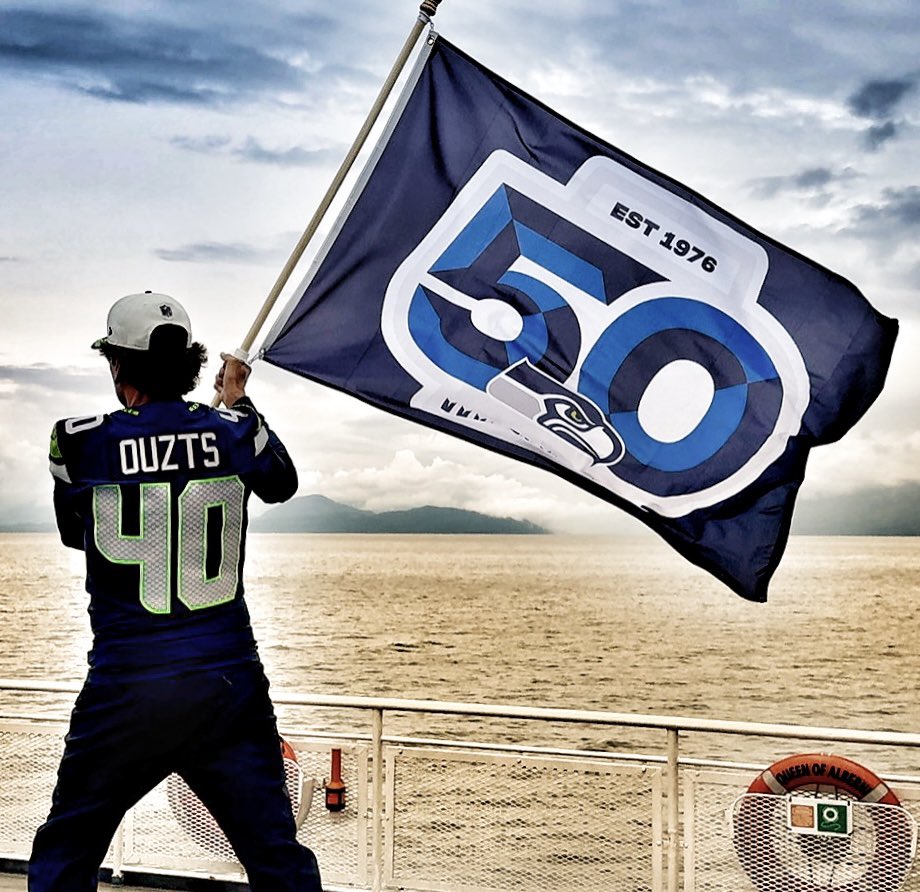 Charging into the <a href="/Seahawks/">Seattle Seahawks</a> 50th season with a <a href="/robbie_ouzts/">Robbie Ouzts</a> jersey.
