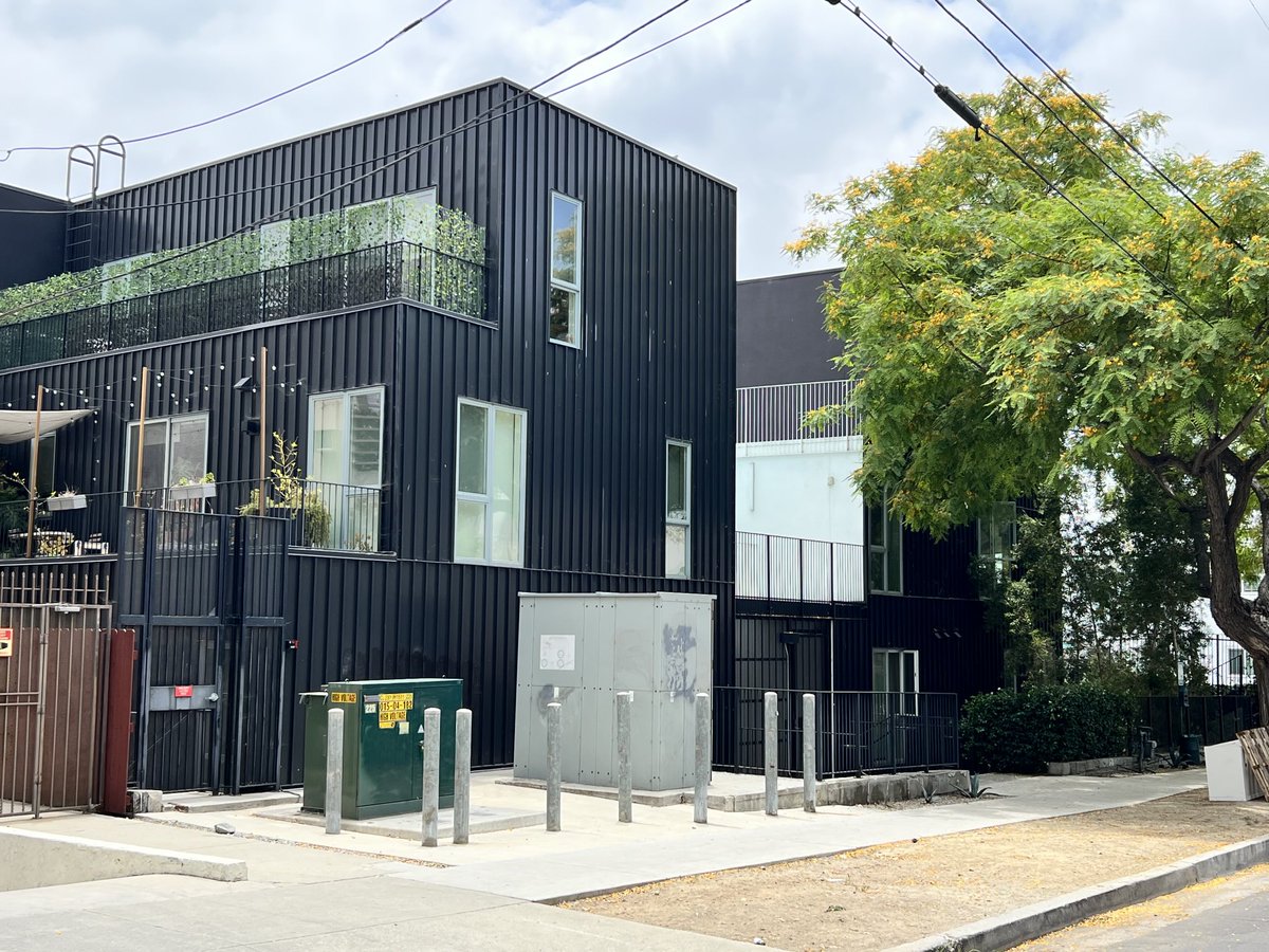 This is what's wrong with the City of Los Angeles' building permit "clearance process" in a picture. Random depts, like LADWP, get to demand crazy things like this transformer pad in the most prominent spot on the sidewalk. You say "yes" or delay construction by a year.