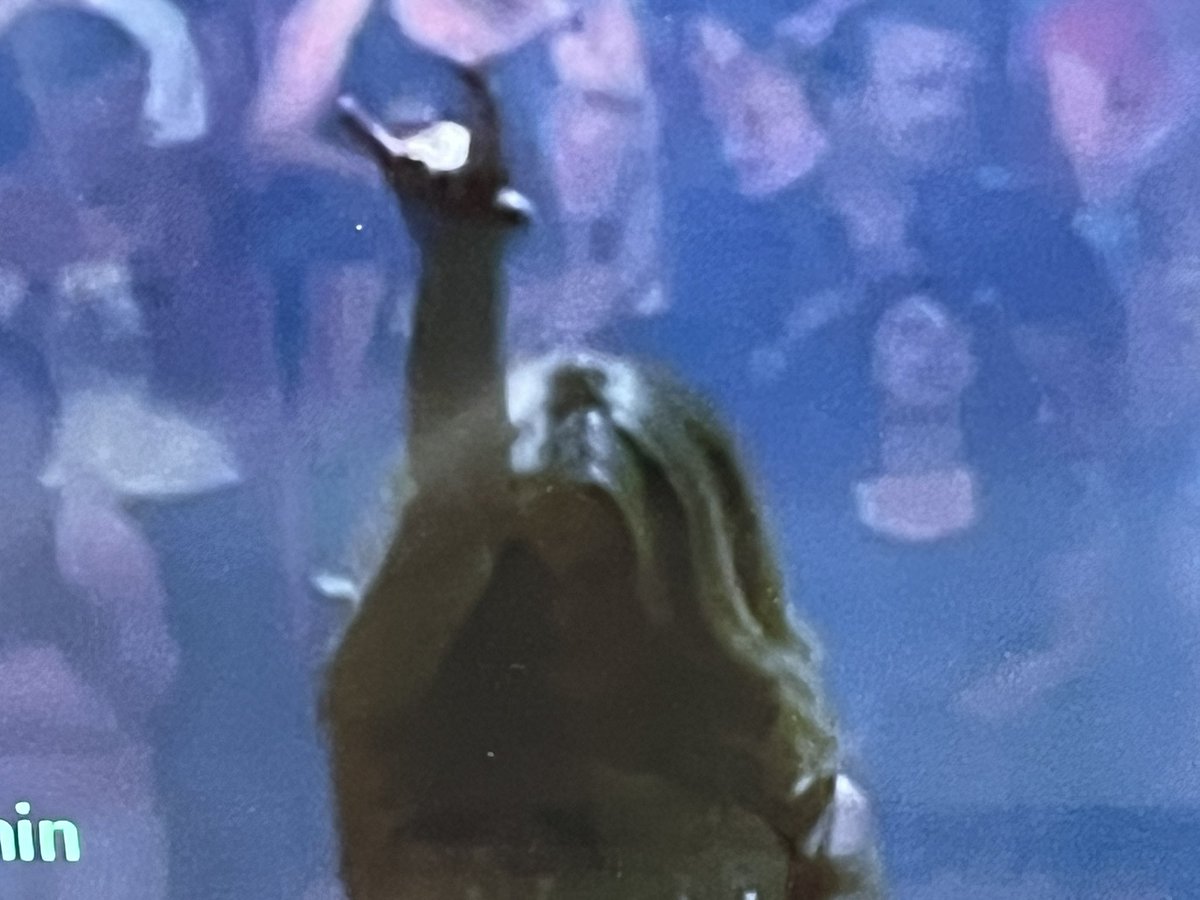 Here’s Celine Dion giving the devil sign, is there nobody who isn’t famous who hasn’t sold their soul.
