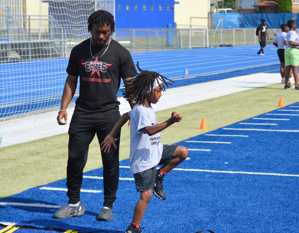 More than 60 athletes participated Saturday morning in the 3rd annual Baylock Elites Youth Football Camp and Clinic at Bloom High School in Chicago Heights in honor of Southern Illinois QB D.J. Williams' late childhood friend, Jacquice Baylock.