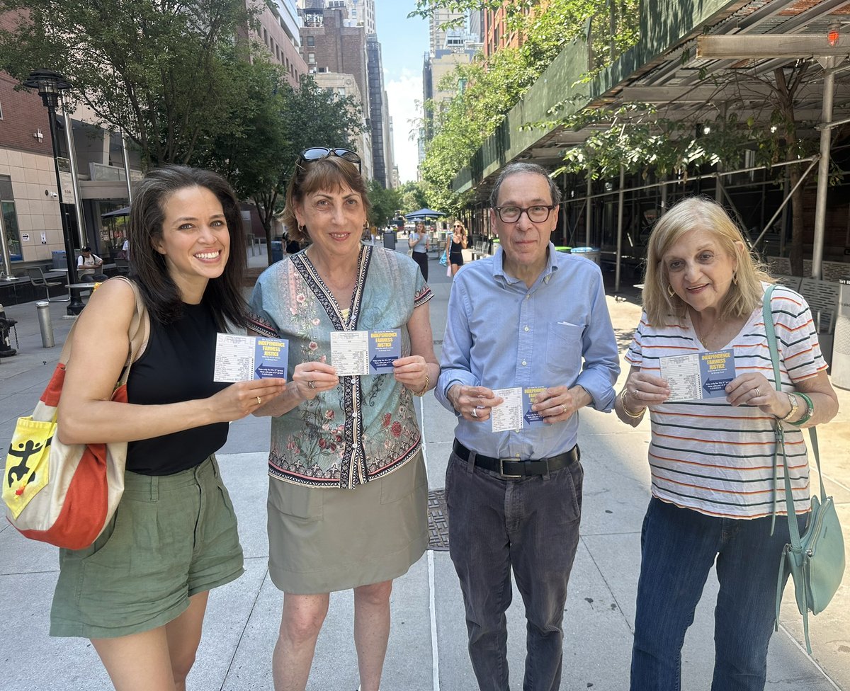 Four judicial delegate candidates for Assembly Dist. 74—Alana Sivin, Judith Gross, Gregory L. Lambert, Myrna Lepree—pause at early voting today. They're among 13 candidates running united in group 2 on the ballot. Group 2 covers the 13 best to protect our democracy, Constitution.