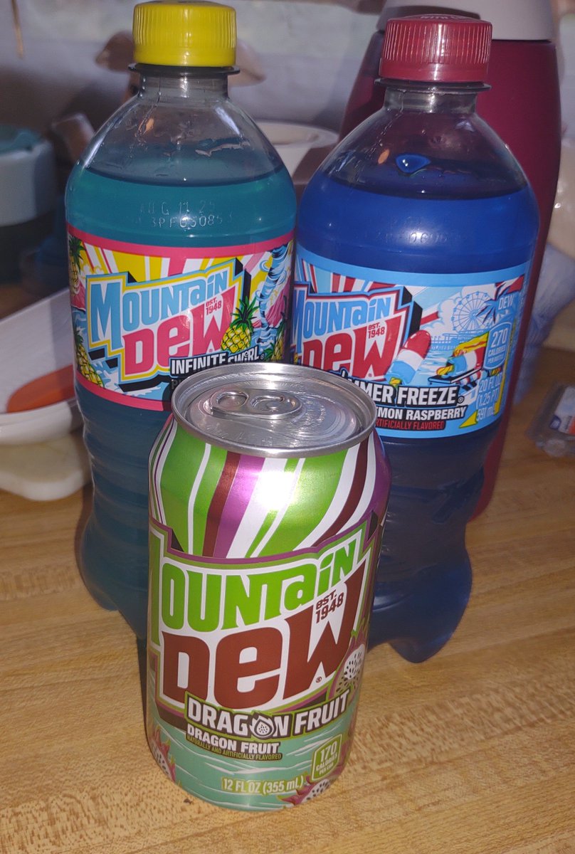Three new flavors of Mountain Dew. Well, two are returning flavors. Of course I had to buy all three. I might be slightly addicted. Dragon Fruit I'm a little scared of. The pineapple berry one is delicious. The cherry, lemon, and raspberry is pretty good.
