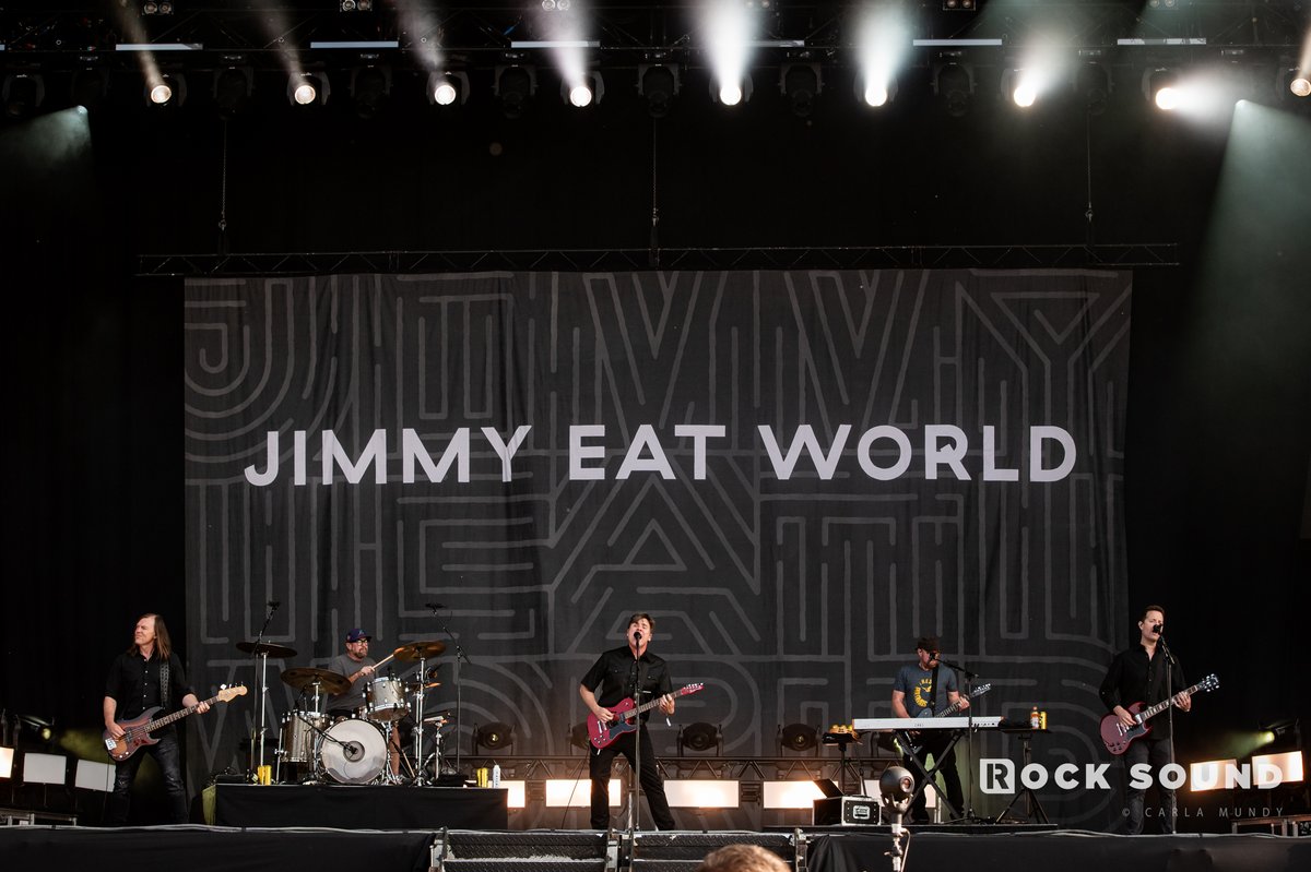 Jimmy Eat World, Download Festival 2025

REVIEW: Jim Adkins is having the loveliest time right now. 
There’s a mix of total contentment and humbled appreciation plastered across his face as he looks out from the Apex Stage, Jimmy Eat World’s first experience of the Download