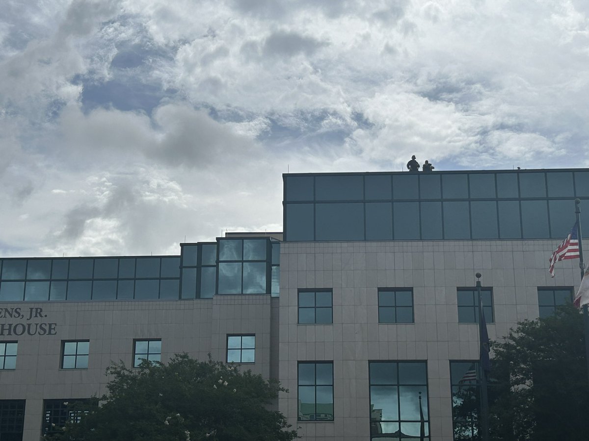 Law enforcement on top of the courthouse. Again, things are calm here. Everyone is being safe and respectful.