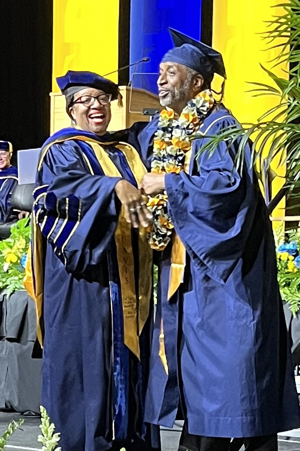 At <a href="/ucdavis/">UC Davis</a> commencement Saturday, <a href="/CalAggieAlumni/">UC Davis Alumni</a> Association VP Deborah Thompson Austin embraces the grad she loves the most: her husband. Ron Austin, 66, returned to UC Davis to earn the few units he left outstanding in 1981. Read his inspiring story: ucdavis.edu/news/uc-davis-…