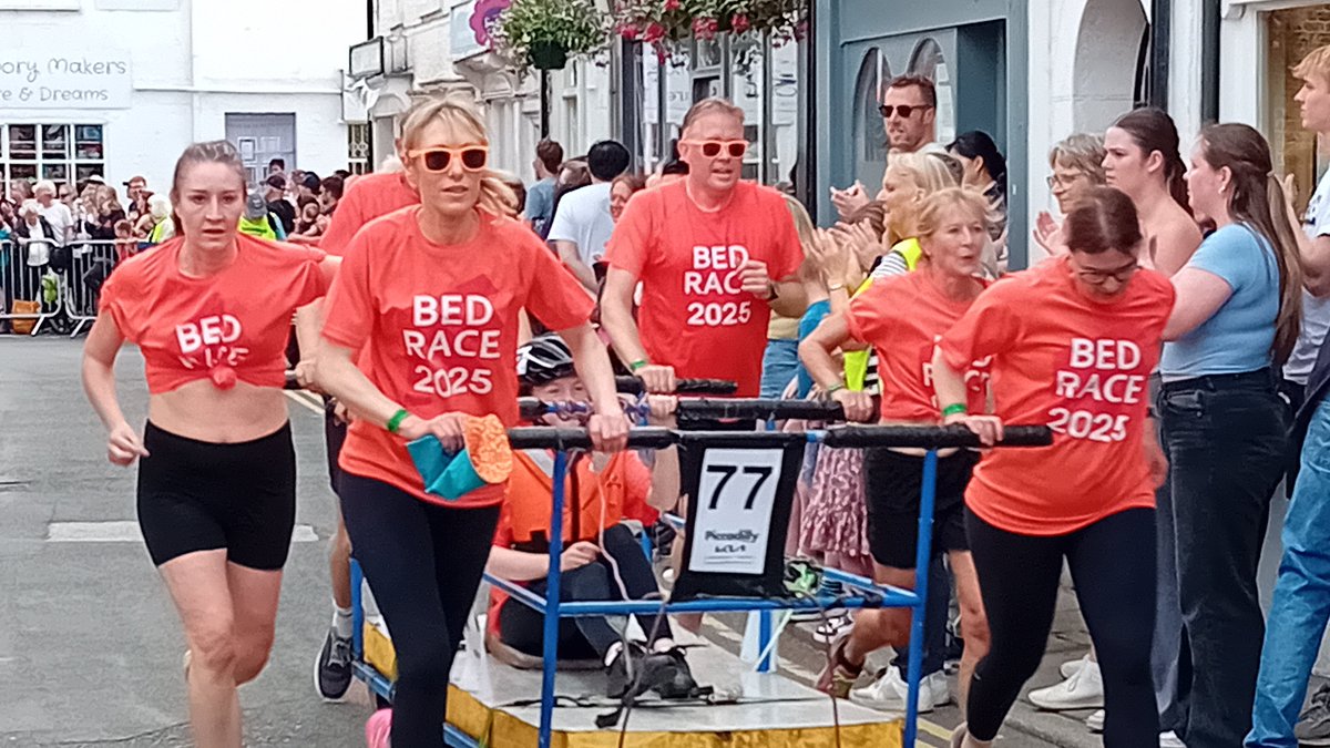 Knaresborough bed race. Racing "beds" through narrow streets for charity, and they all got very hot and sweaty doing it! Good bonkers fun to watch, though.