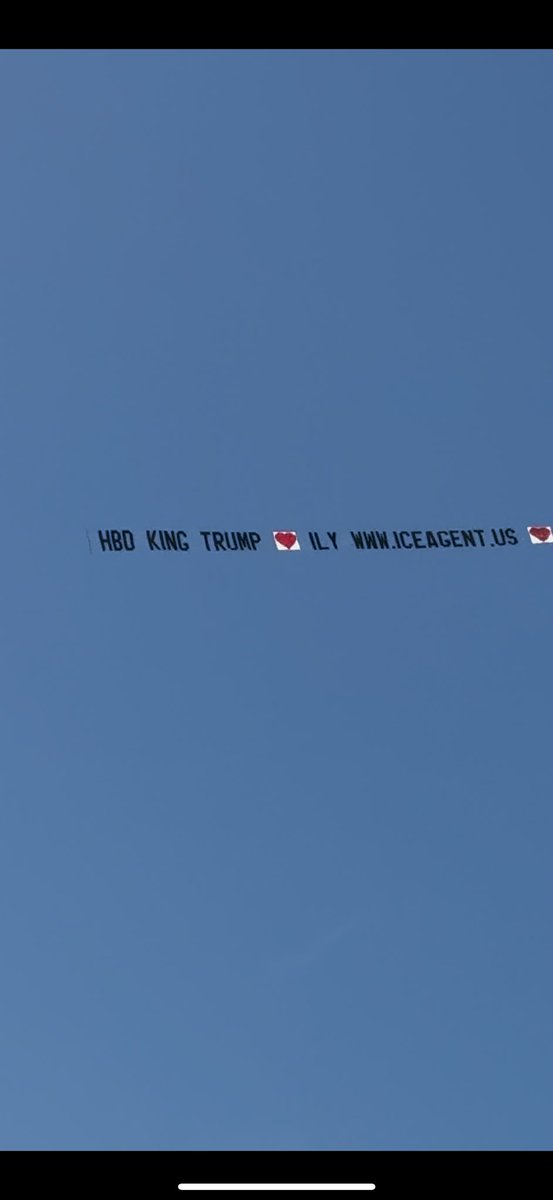 chrissgardner's tweet image. President Donald Trump’s birthday celebration has reached the California coast. There’s a plane above Santa Monica Beach trailed by a sign that reads, “HBD King Trump ILY” along with a website that promotes “NFT for patriots.”
