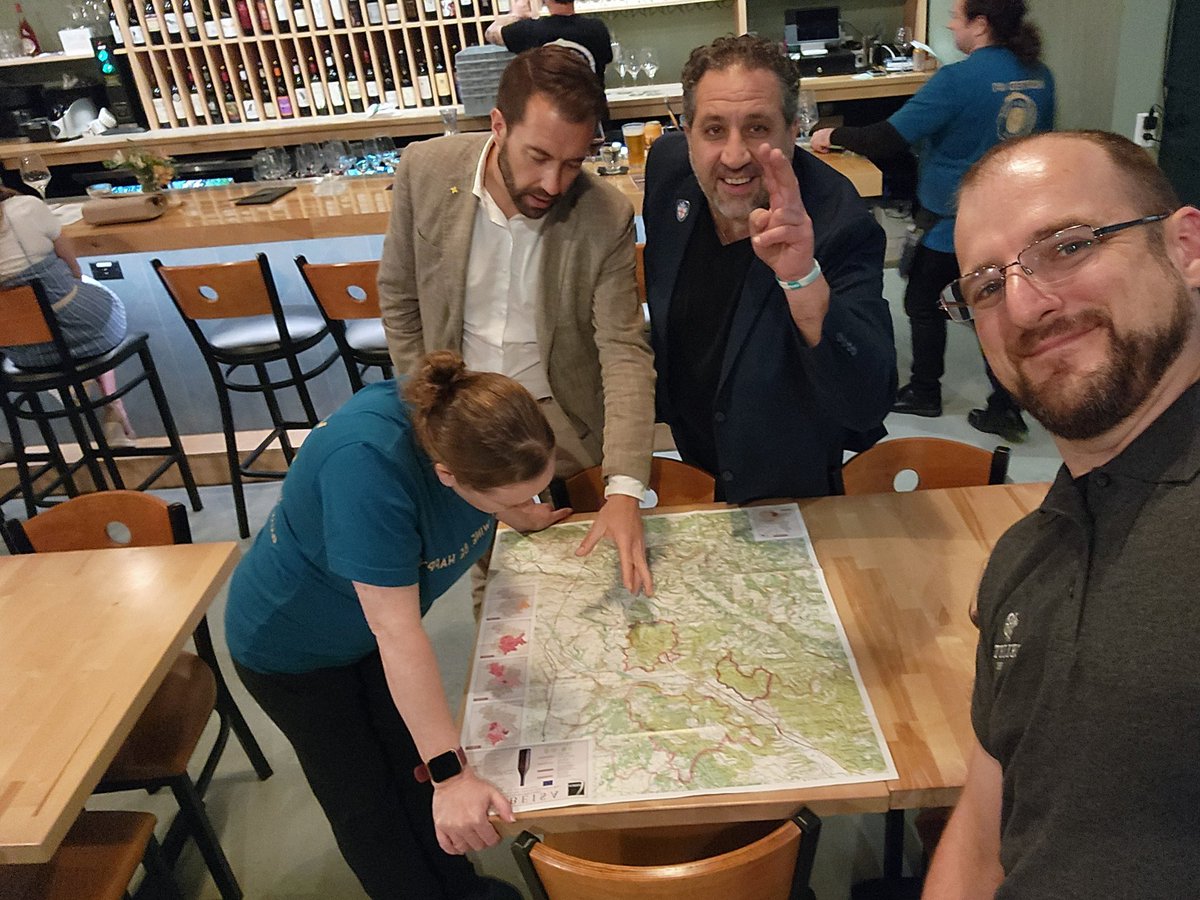 Amazing tasting dinner last night with Deltetto winery.   Of course B is looking at a map.