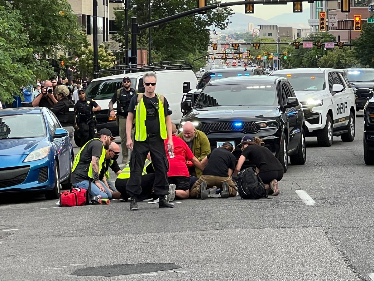 SLCScanner's tweet photo. #Breaking Salt Lake City Police report a shooting near 200 S. State St. during the No Kings protest, leaving one person critically injured and hospitalized with life-threatening injuries. Officers request the public to evacuate calmly and safely. The situation remains dynamic. Media staging is at 100 South 300 East. #NoKingsDay #SLC #Utah