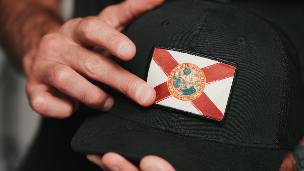 InitBrand's tweet image. Rep the Sunshine State with pride 🌞🐊 Featuring the Florida flag patch as a bold nod to where it all started #YourHatCanDoMore