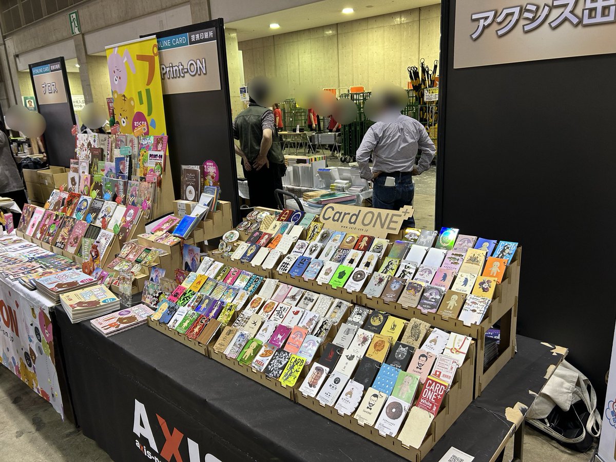 プリントオンです。
星に願いを 東5ホールにてPRデスク設営が無事完了です！
本日販売の装丁の箱庭、箔押しサンプル帳、たくさんご用意してお待ちしてます。
見本も多数お持ちしましたのでぜひお立ち寄りください！