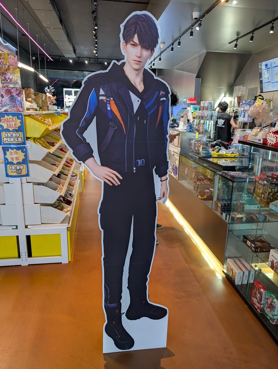 SO I WON A CARBOARD CUTOUT. WE'RE PROTECTING HIM FROM THE RAIN