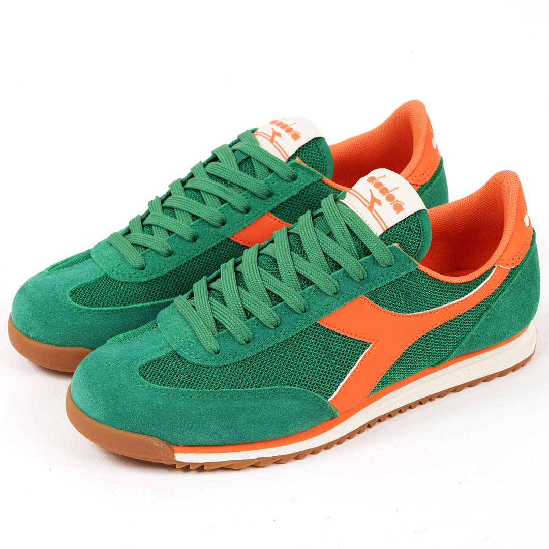 Fresh and vibrant colourway of the Diadora Cross trainers,  a sleek and low profile style in green with orange stripe details. Shop these today: 80scasualclassics.co.uk/trainers-c12/d…
