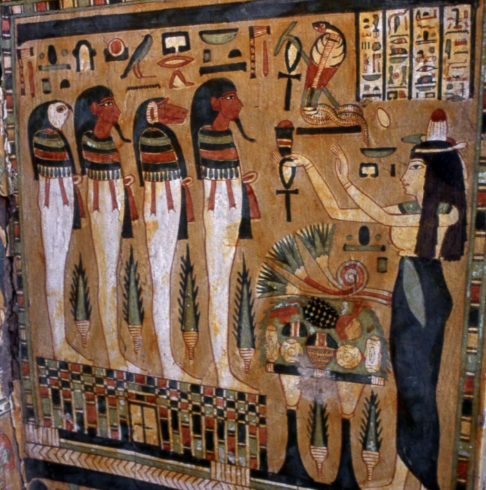 Detail of the coffin of Amenemipet, c. 950-900 B.C.

From Deir el-Bahari. Now at the British Museum. EA22941

▫ In this scene, a woman wearing a perfume cone (possibly a relative of Amenemipet) is seen offering tribute before the uraeus who delivers life through an ankh.

The