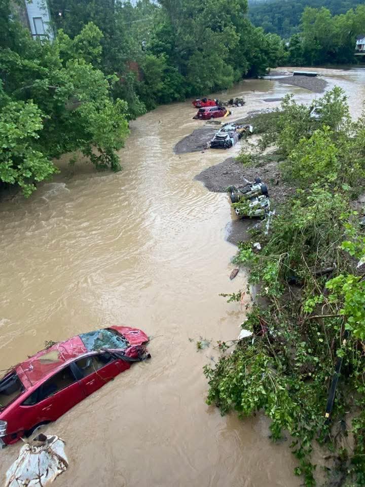 MountainWX's tweet photo. Images emerging from Wheeling WV at first light just show devastation this morning. The Wheeling Creek watershed is in tatters.

We really got smashed. #wvwx https://t.co/qRNS8L18VT