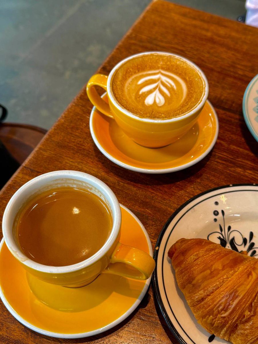 Enjoying a cozy morning with a latte and a croissant☕