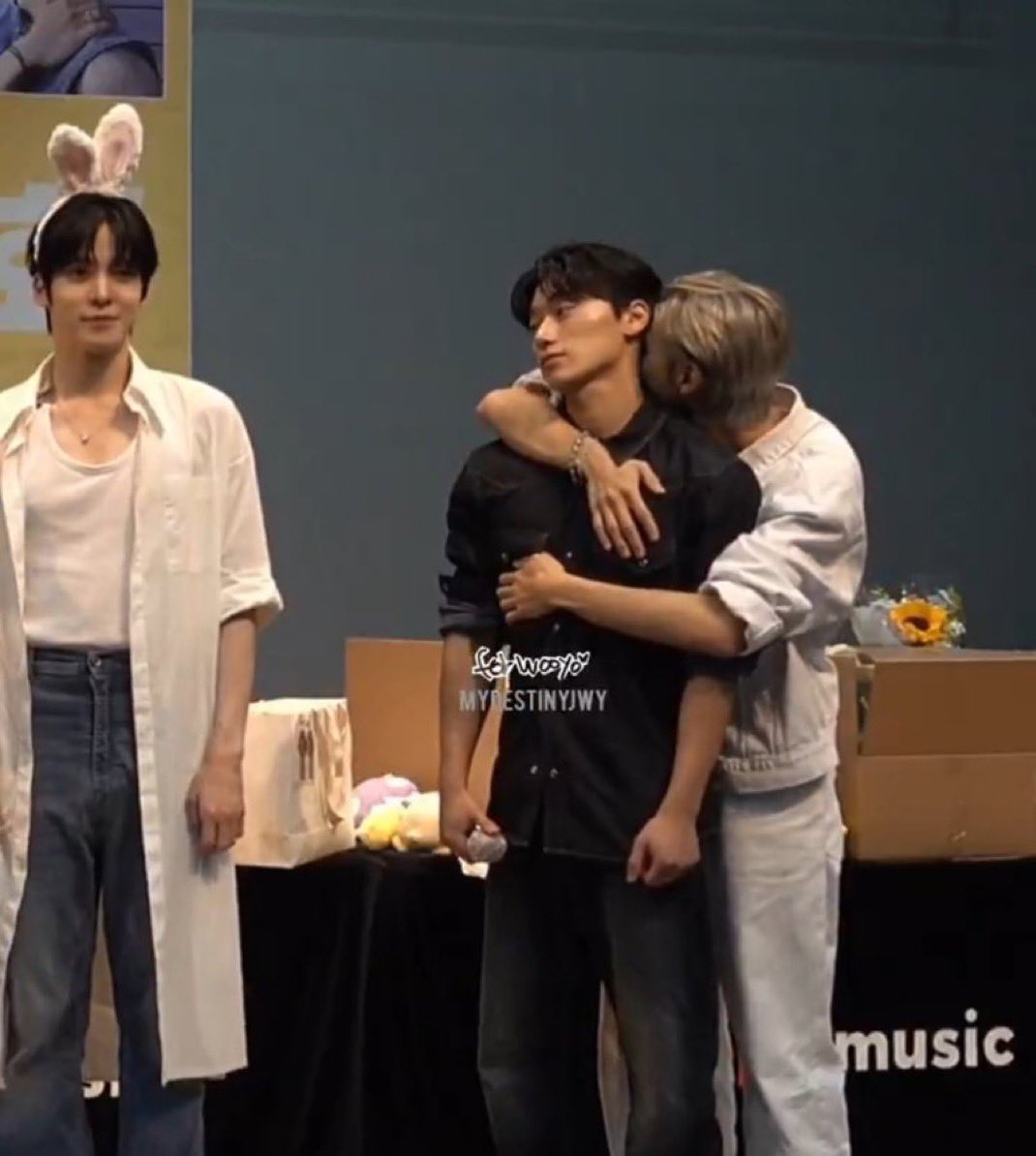 me and the couple behind me waiting in line at an amusement park