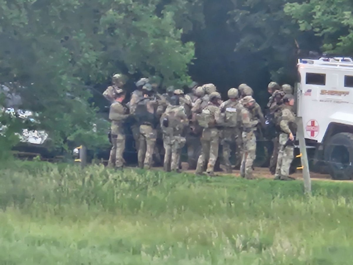 NOW: A friend just sent me these photos from their family’s farm in Green Isle. It neighbors Boelter’s. He says SWAT/officer presence grew several minutes ago and a K9 was barking in the woods. But moments ago every law enforcement vehicle just took off speeding west on 200th St.