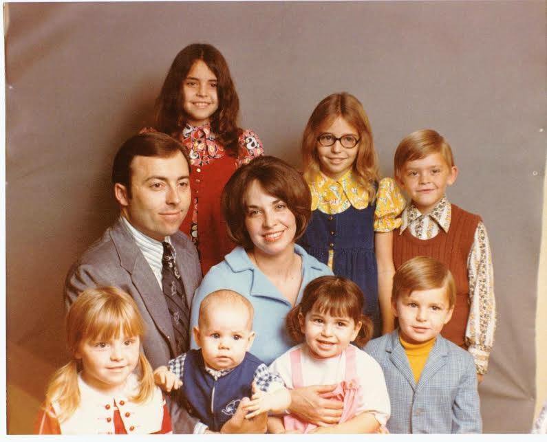 I was looking at old photos of my Dad today missing him terribly when I came across this pic of him when I was a little girl (I’m the little dark-haired girl in pigtails sitting in my Mom’s lap).  Having just spent the day with my six little grandkids I could easily envision the