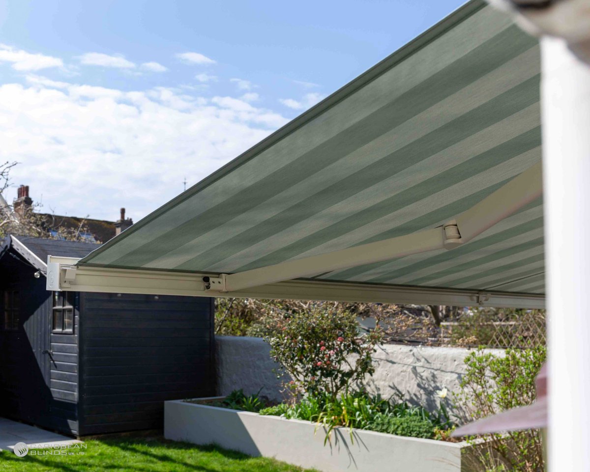 Everybody loves a stripe! Enjoy shade and style with our patio awnings this season #outdoorliving #patioawnings #caribbeanblinds #madeinbritain