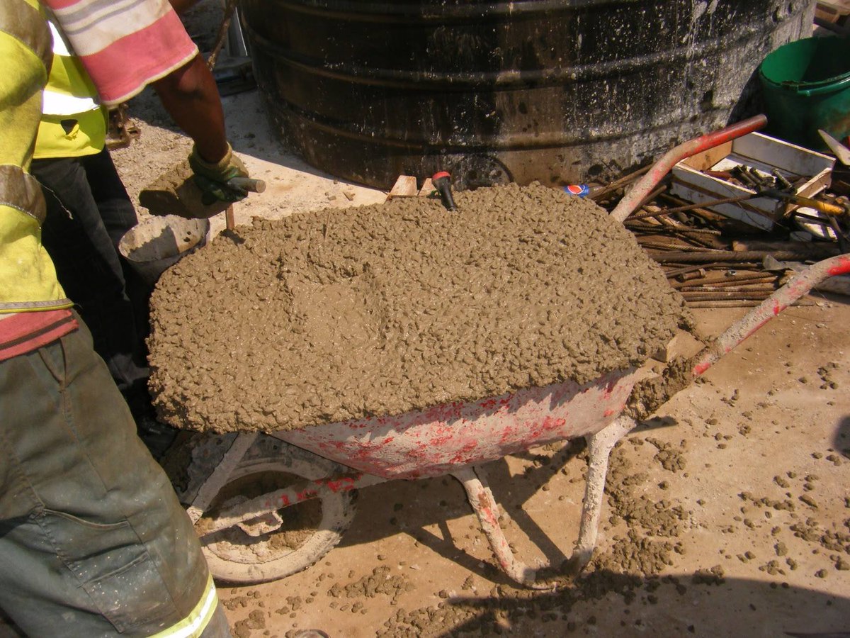 ApolloBuregyeya's tweet photo. If Your Wheelbarrow Looks Like This, You're Not Saving Money. You're Wasting It.
=====

Let’s break it down.

1. The wheelbarrow breaks.
~~~~~~~
Load it to the brim like this and you’ll be replacing wheels before you finish the day. That's time lost, money gone, and momentum broken.

2. Concrete spills.
~~~~~~~~
You waste sand, stone, cement, and labour. You lose over 20% of your mix, which is roughly 140k UGX gone for every 700k spent on a cubic meter. That’s not a site problem. That’s a management failure.

3. Your workers burn out.
~~~~~~~~~~
Muscle fatigue, injuries, early exhaustion. Productivity dies by lunchtime. Tomorrow, they show up slower or they don’t show up at all.

Let me put it another way:
~~~~~~
The energy it takes to force through 10 overloaded wheelbarrows can deliver 100 half-loads. The first gives you just under 10 useful deliveries after spillage and pain. The second gives you 50 full ones, clean and smooth, with healthy workers still standing strong.

At Eco Concrete Ltd @ecoconcreteUG , this is what we practice. Concrete is not a game of strength. It’s a science of timing, skill, and care.

It’s not just about getting the job done. It’s about getting it done well, with minimal loss and maximum dignity.

If your site needs this kind of thinking, we’re just a call away: +256 772 435 763

Let’s build smarter.
Let’s lead with knowledge.