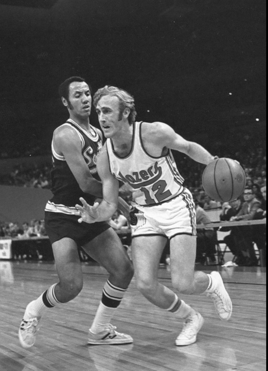 77Blazers's tweet photo. #HBD to former @trailblazers player, captain, assistant coach, head coach, and #Naismith @Hoophall member .... #RickAdelman
Adelman was one of the original #Blazers, starting as the point guard on the 1970-71 team, where he averaged a career-high 12.6 points and 4.7 assists over 81 games that first season. Adelman spent three seasons with #Portland, averaging 9.8 points and 4.6 assists in 237 games. He set the team record with 17 assists in 1971, a record that would hold for 16 years before @terryporter30 topped him with 18 assists, but his 237 games as a player wouldn’t begin to describe his contributions to the organization.
His real legacy with the club began midway through the 1988-89 season.
#JackRamsay hired Adelman as an assistant in 1983. When Ramsay was fired and replaced with #MikeSchuler in 1986, Adelman was retained. When Schuler was in turn fired midway thru the 1988–89 season, Adelman was promoted to interim coach, guiding the team to a 39-43 record. Despite a first round playoff loss, Adelman was given the coaching position on a full-time basis in the 1989 off-season.
The next three years were quite successful for Adelman and the Blazers. The team went to the @NBA Finals in 1990 and 1992 (losing to the @DetroitPistons and the @chicagobulls respectively) and went to the #WCF in 1991 (losing to the @Lakers).
Adelman spent two more years with the team, but was dismissed after the 1993–1994 season, with an overall record with Portland was 291-154. Overall, Adelman played or was on the coaching bench for 1,230 games in his 15 years with the club.
#RipCity #ThisDateInBlazersHistory #OTD
