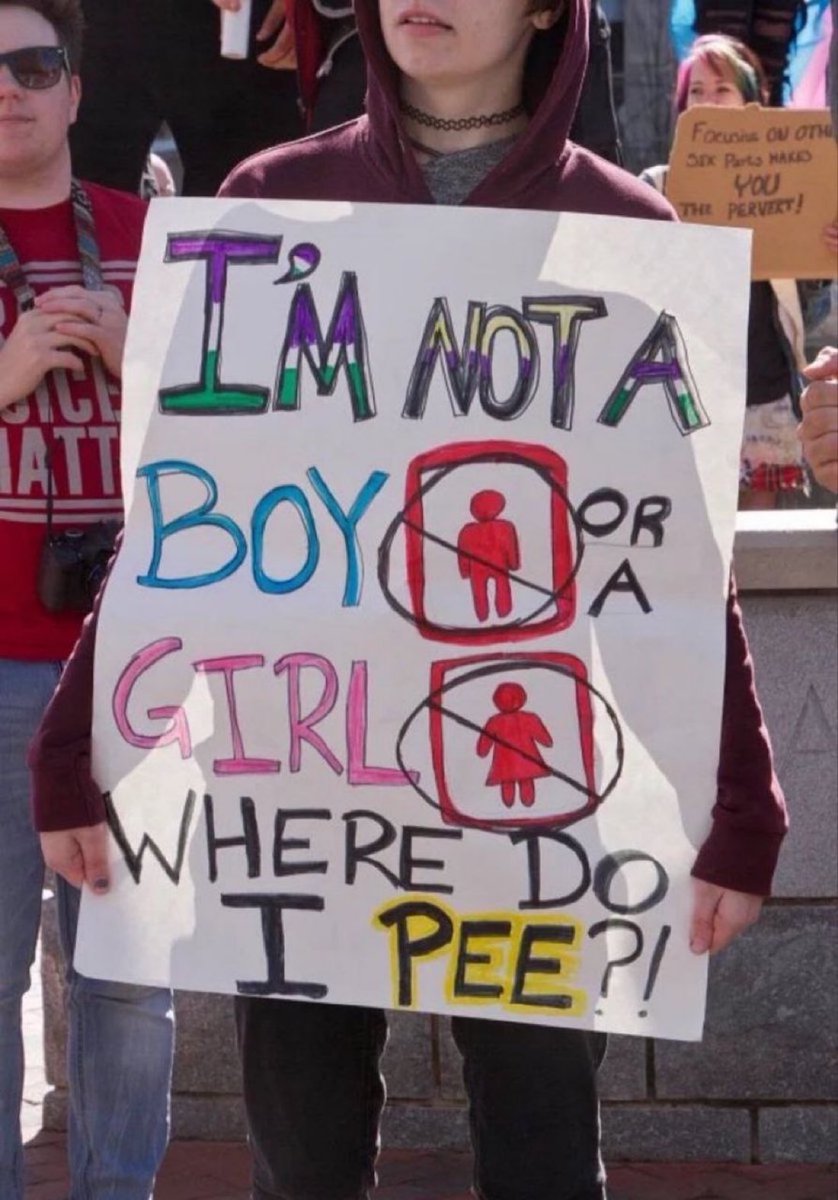 What do you say to the person holding this sign? 🪧 

🤔🤔🤔