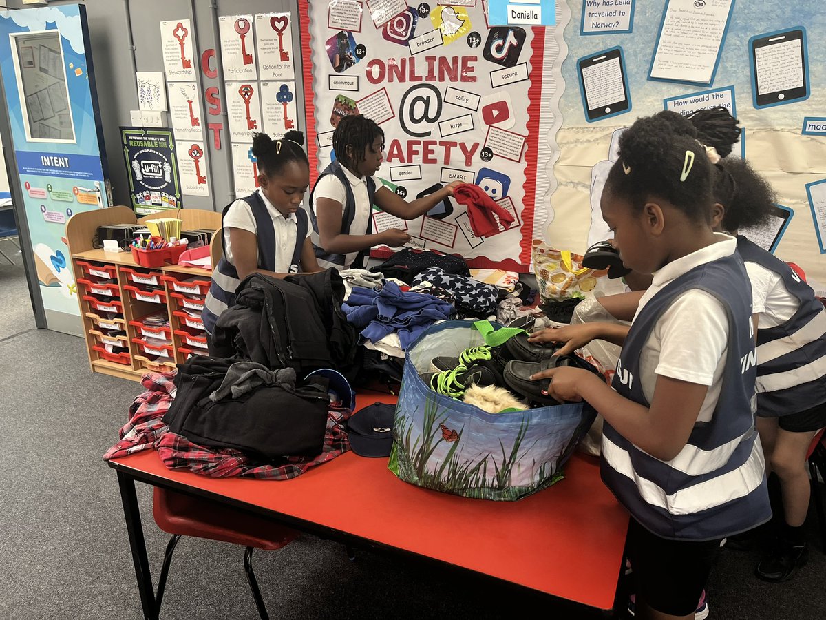 StJohnFisherCPS's tweet photo. What a busy few weeks our Mini Vinnies have had.!  Today, they helped to bag up clothes, shoes, toys and books left over from our jumble sale on Friday to take to a local charity shop. https://t.co/LYF8Fhnmlp