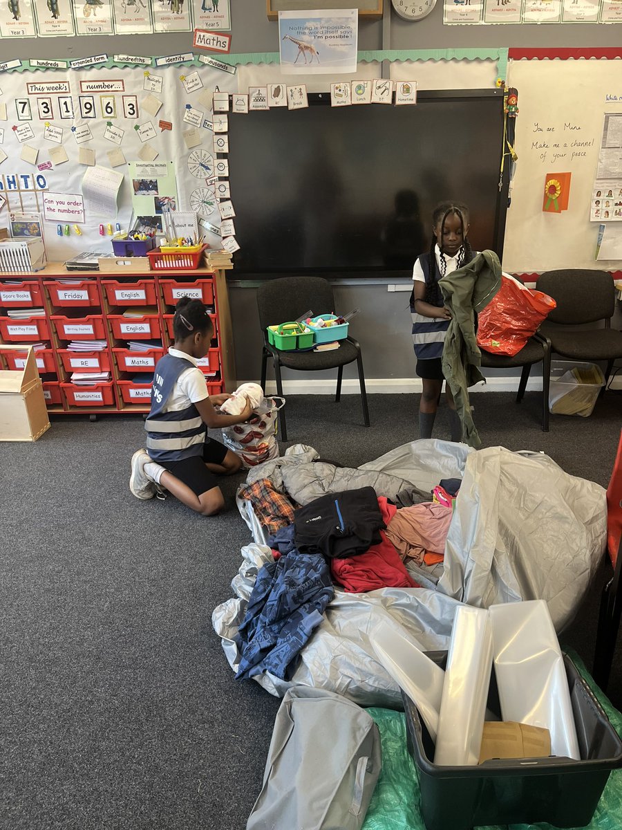 StJohnFisherCPS's tweet photo. What a busy few weeks our Mini Vinnies have had.!  Today, they helped to bag up clothes, shoes, toys and books left over from our jumble sale on Friday to take to a local charity shop. https://t.co/LYF8Fhnmlp