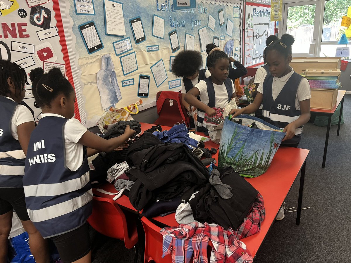 StJohnFisherCPS's tweet photo. What a busy few weeks our Mini Vinnies have had.!  Today, they helped to bag up clothes, shoes, toys and books left over from our jumble sale on Friday to take to a local charity shop. https://t.co/LYF8Fhnmlp