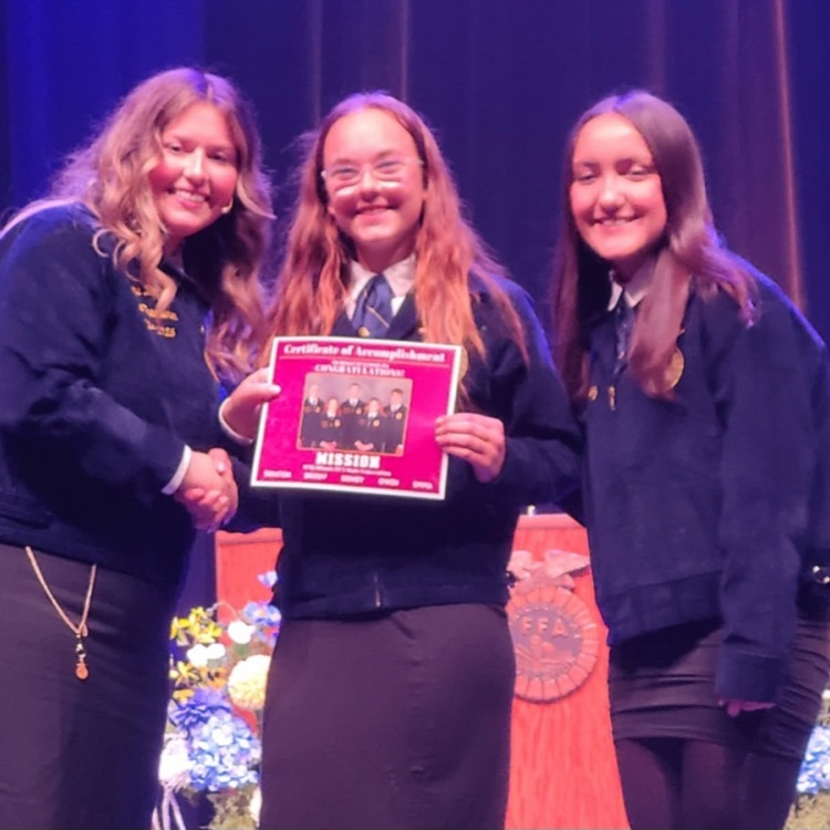 Mya &amp; Liz accept the Earlville FFA Silver rating for their National Chapter Award presented at the 97th IL FFA State Convention