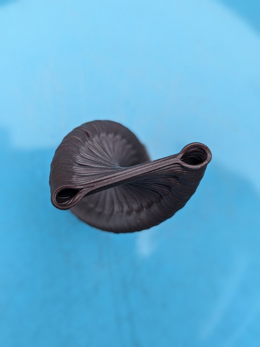 TGAW's tweet image. After shamelessly studying and scrutinizing @davemakesstuff_ models, I can now eat Chocolate DNA from the @CocoaPress ! Assuming I can fend off my family, of course-- that is proving to be the hardest part of printing chocolate. 🤣