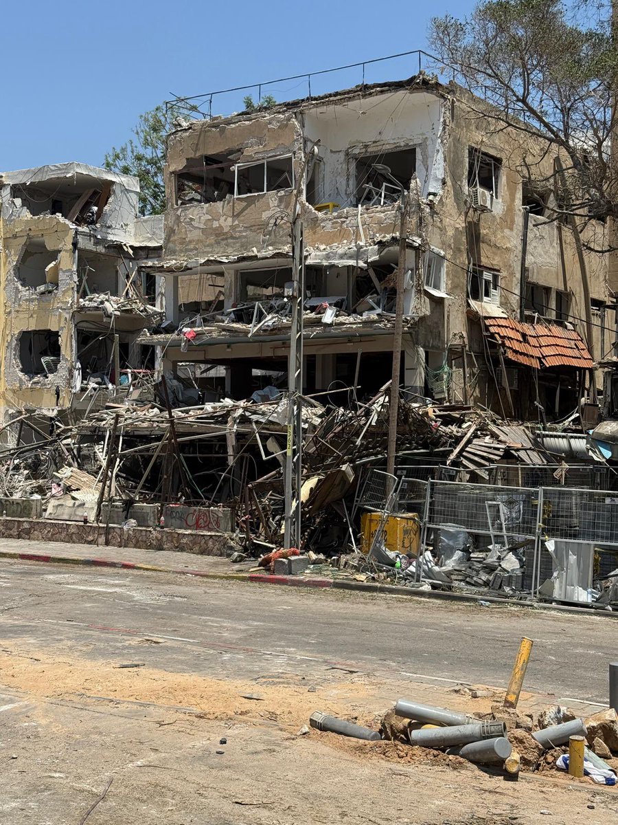 Rough night in Israel. Iran went right for the heart of the civilian population. Eight killed including kids, and hundreds injured. 

This is a few houses down from my sister in Tel Aviv. She and her husband, 4 kids and 2 cats had to evacuate in the middle of the night. I just