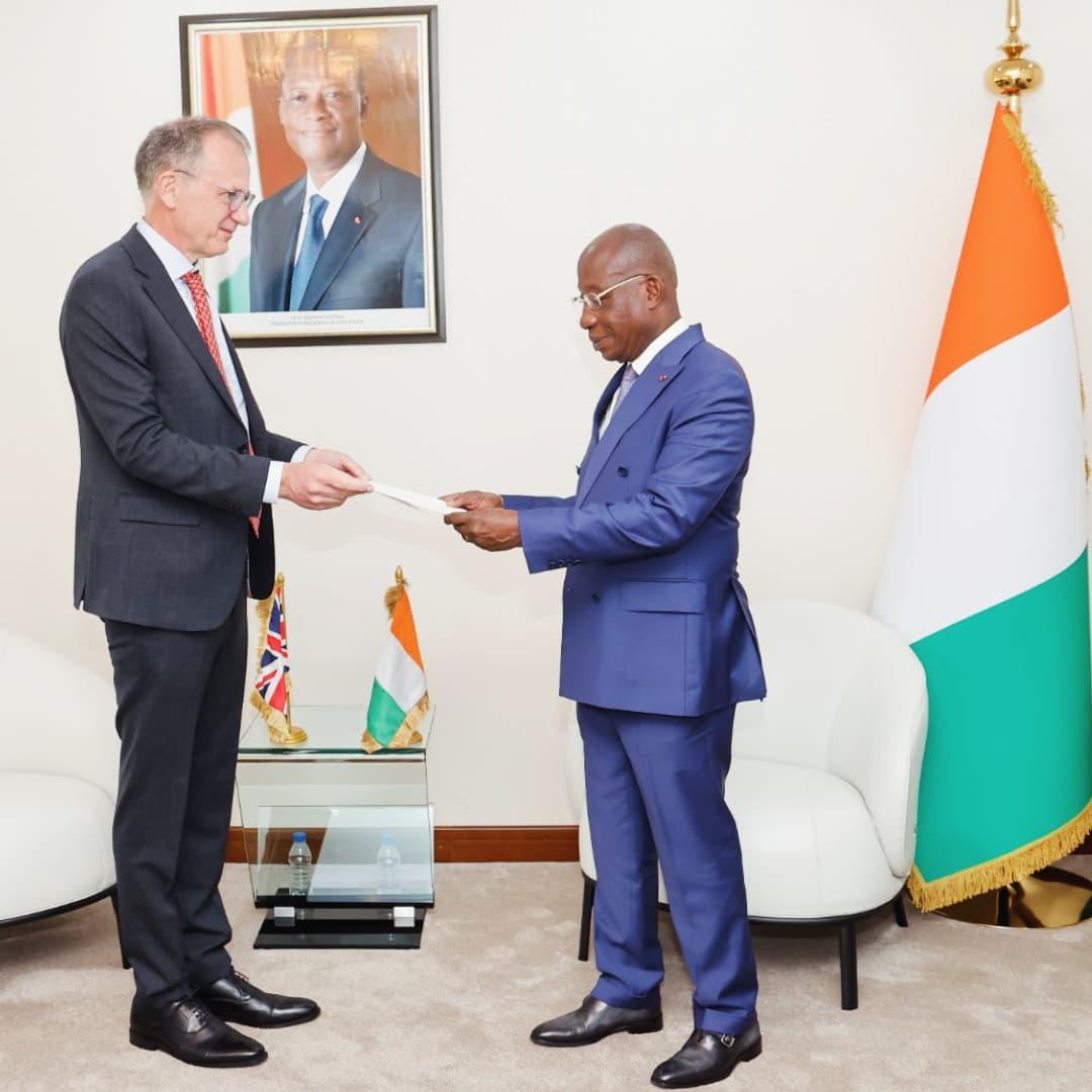 UKinCotedIvoire's tweet photo. Our new Ambassador has arrived and submitted his letter of credence to the Minister of Foreign Affairs S.E.M Léon Kacou Adom. Can you guess who he is?

🔹 Ex-Ambassador to Guinea and  Senegal
🔹 UN experience
🔹 Climate &amp; Inclusion advocate 👀

#UKinCIV #GoFarGoTogether https://t.co/LH0emsxXOB